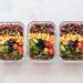 Teenused – toitumine ja liikumine *tervislikumad valikud* erivajadustega inimestele Colorful healthy meal prep with corn, olives, tomatoes, and lentils in glass containers. Perfect for mindful eating.